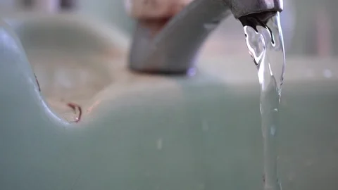 Faucet with water, close up. Stock Footage 100056215