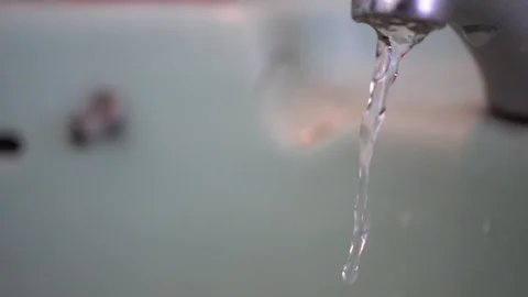 Faucet with water, close up. Video stock 100056570