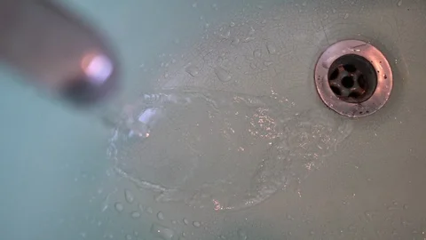 Faucet with water, close up. Stock Footage 100057117