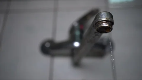 Faucet with water, close up. Stock Footage 100837367