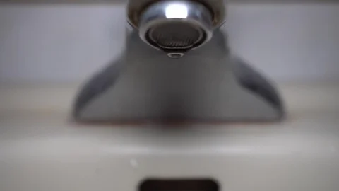 Faucet with water, close up. Video stock 100840675