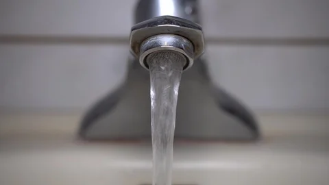 Faucet with water, close up. Video stock 100840949