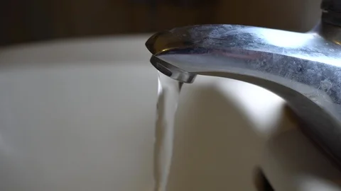 Faucet with water, close up. Stock Footage 100841847