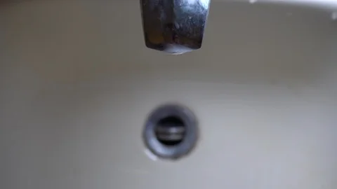 Faucet with water, close up. Stock Footage 100842075