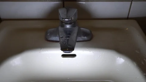 Faucet with water, close up. Stock Footage 100907138