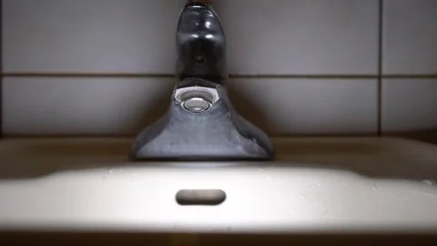 Faucet with water, close up. Stock Footage 100909069