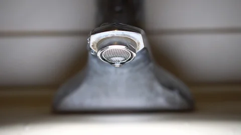 Faucet with water, close up. Stock Footage 100910034