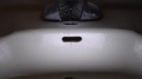 Faucet with water, close up. Stock Footage 100910287