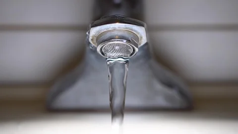 Faucet with water, close up. Video stock 100910743