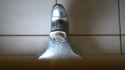 Faucet with water, close up. Stock Footage 100911666