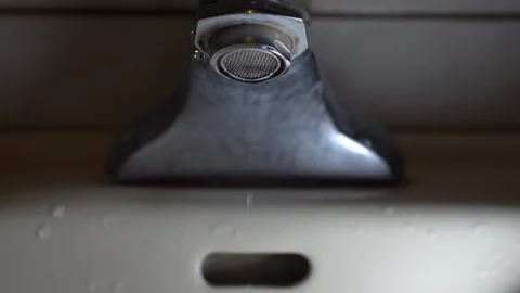 Faucet with water, close up. Stock Footage 100912607