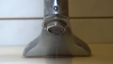 Faucet with water, close up. Stock Footage 100912675