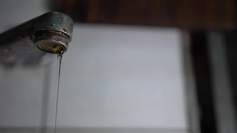 Faucet with water, close up. Stock Footage 100913910
