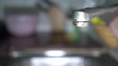 Faucet with water, close up. Stock Footage 100914384