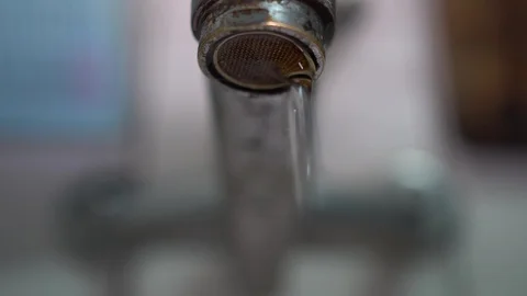 Faucet with water, close up. Video stock 100916710