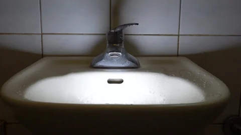 Faucet with water, close up. Video stock 105892383