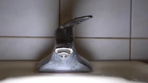 Faucet with water, close up. Stock Footage 105892591