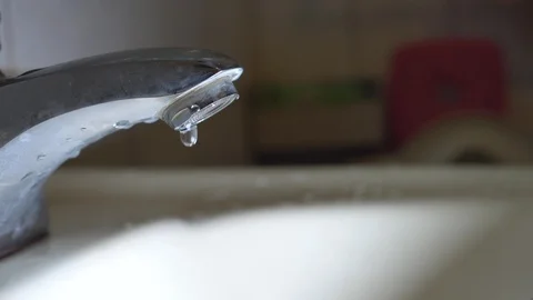 Faucet with water, close up. Video stock 105892671