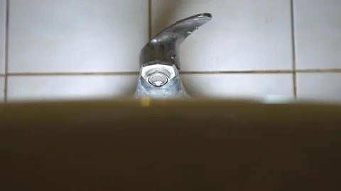 Faucet with water, close up. Stock Footage 105892783