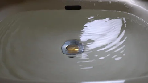 Faucet with water, close up. Video stock 105893770