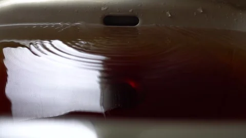 Faucet with water, close up. Video stock 105894304