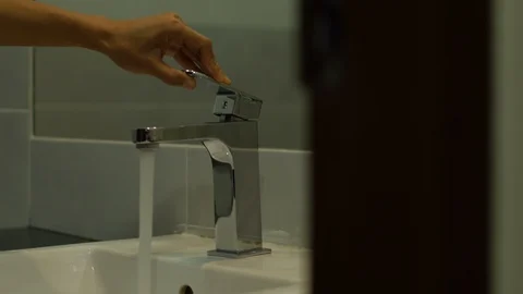 Faucet with water. Close up. Video stock 112536796