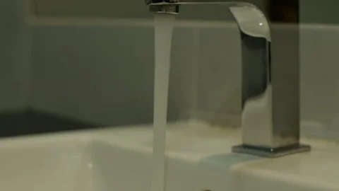 Faucet with water. Close up. Video stock 112537628