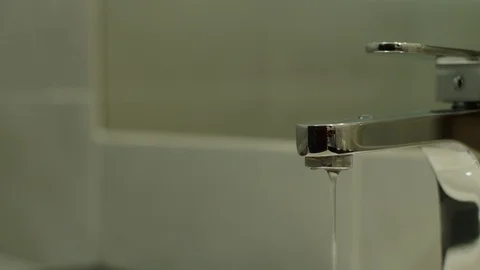 Faucet with water. Close up. Video stock 112537966