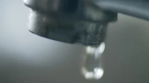 Faucet water dripping. Water drop waste, shallow depth of field macro 스톡 동영상 132733537