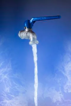 Faucet from which flows a very cold water flow Stock Photos