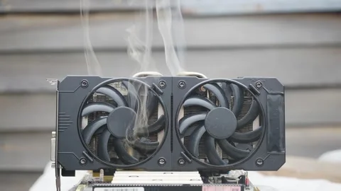 Faulty burned-out video card with two coolers from the computer. 動画素材 344033275