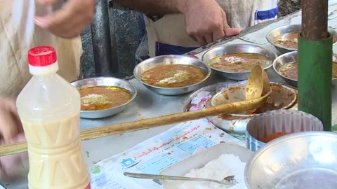 Fava Beans Served with Oil Stock Footage 261987751