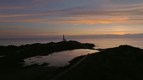 Favaritx  Lighthouse drone landscape of Menorca beach sunset gradient Stock Footage 272590799