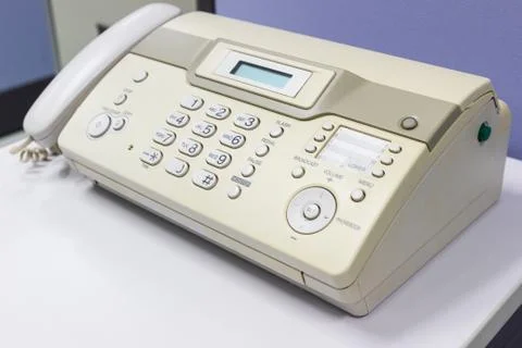 The fax machine for Sending documents in the office Photos