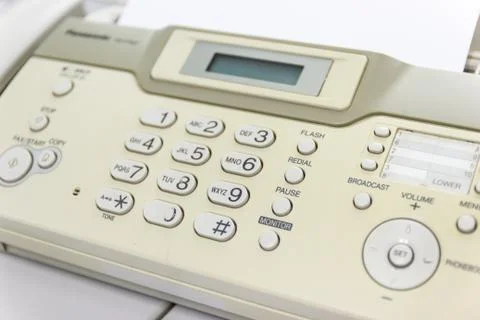 The fax machine for Sending documents in the office Photos
