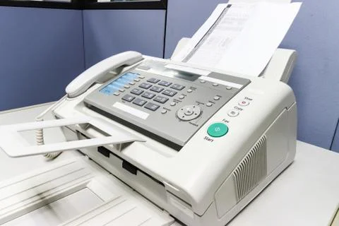The fax machine use for Sending documents in the office 스톡 사진