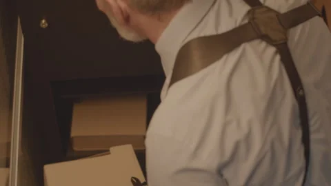 FBI Agent Looking at Criminal Case File Folder Stock Footage 250016410