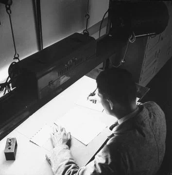 FBI agent translating encoded message., USA Photos