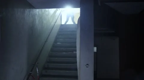 FBI Agents walking down a staircase Stock Footage 63854232