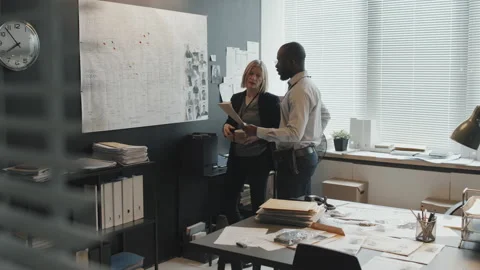 FBI Agents Working in Office Stock Footage 199261428