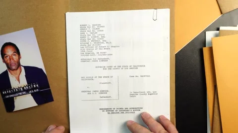 FBI Case Folder File With OJ Simpson Photo, Trial Paper Documents, Flipping Stock Footage 323904919