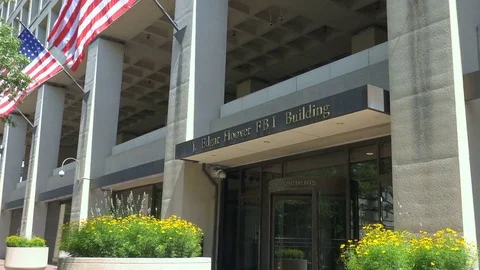 FBI - zoom out sign over door, FBI Building, Washington, DC Stock Footage