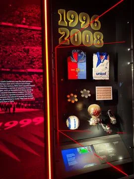 FC Barcelona museum display with jerseys, trophy and soccer memorabilia in .. Stock Photos