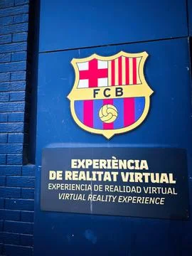 FC Barcelona virtual reality experience signage and club crest on blue wall.. Stock Photos