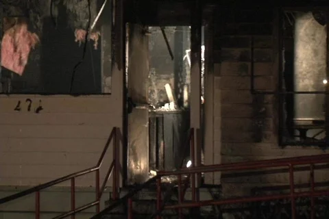 FD exiting burned out building Video stock 822415