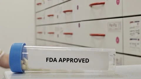 FDA APPROVED tablets meeting regulatory standards for safety and efficacy Stock Footage 333759211