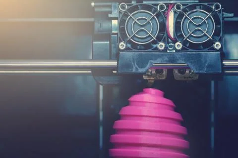 FDM 3D-printer manufacturing wound pink easter egg sculpture - front view on  Stock-Fotos