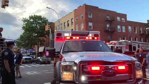 FDNY Ambulance &amp; Rescue Operations arrive at scene during emergency NYC Stock Footage 144576557