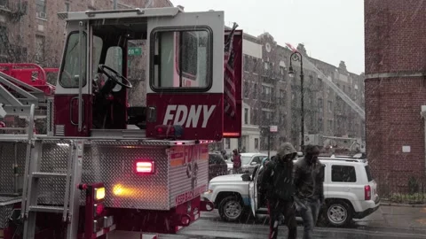 FDNY Fire engine Rear-Wheel Steering Cabin with flashing lights under a Stock Footage 148062461