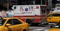 Fdny New York City Ambulance Car Passing in Times Square Crowd of People Walk 4k or 4k+ Resolution
